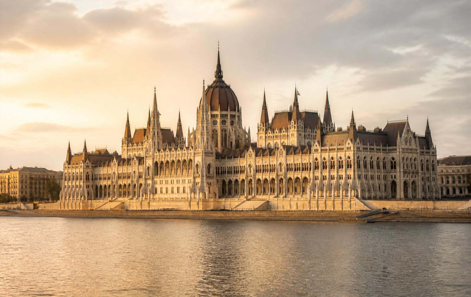 The Hungarian Parliament at golden hour, seen across the Danube